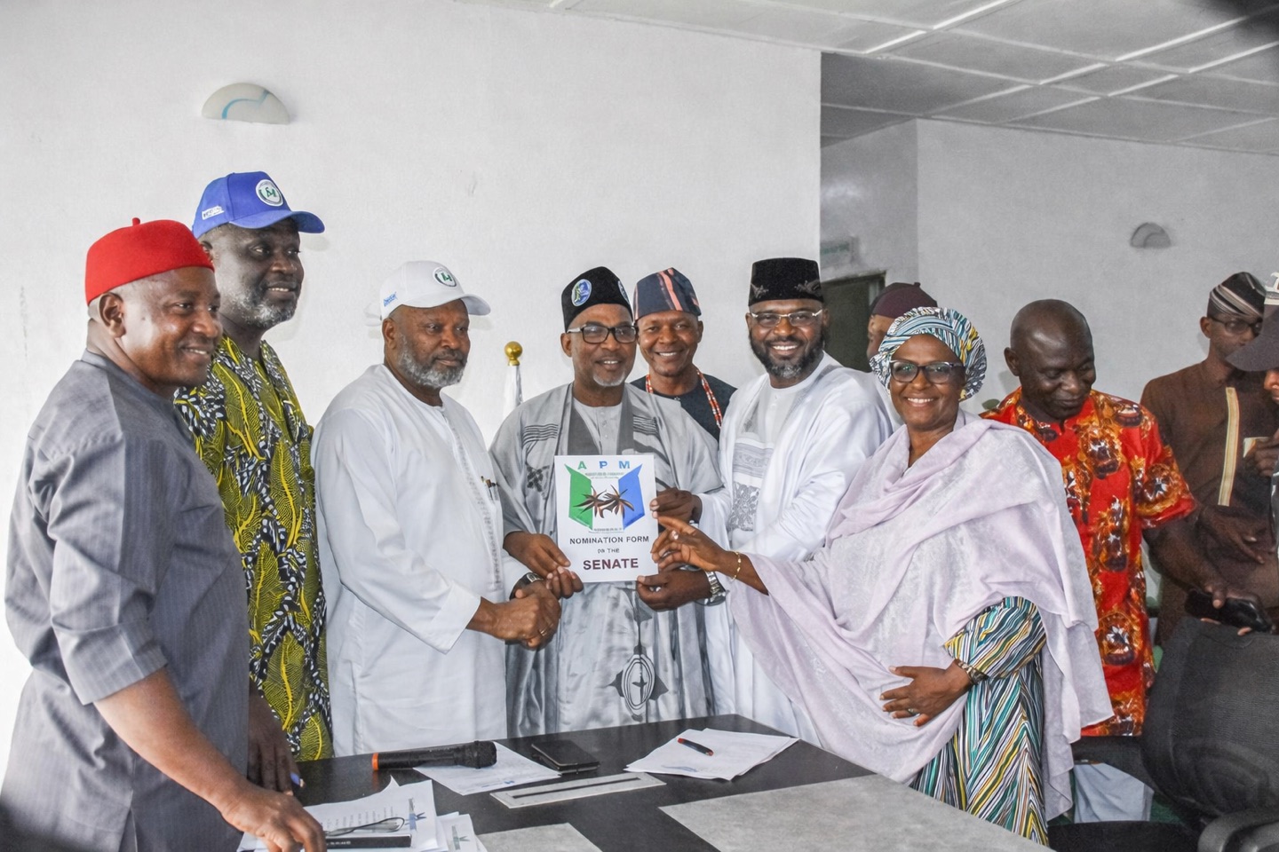 APM officials presenting a party nomination form